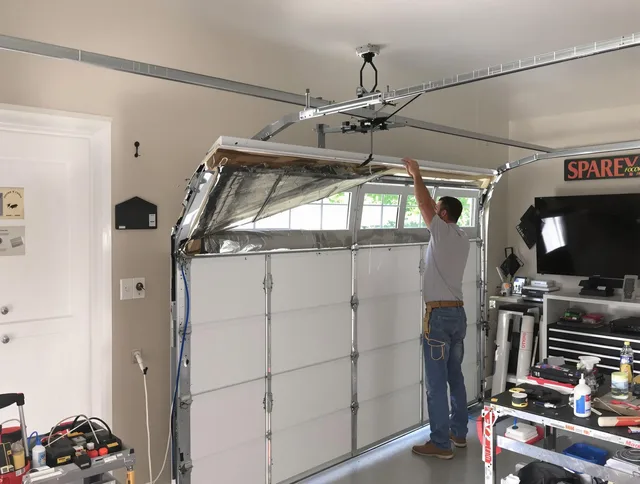 Garage door section replacement by Wolcott Garage Door Repair in Wolcott