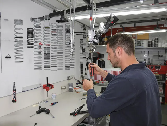 Wolcott Garage Door Repair safety certified technician performing precision spring replacement in Wolcott